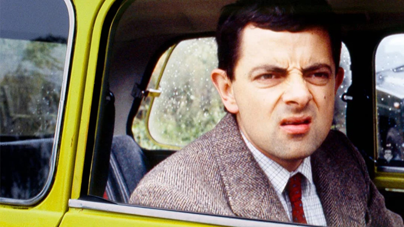   Rowanas Atkinsonas kaip ponas Binas iš Mr. Bean