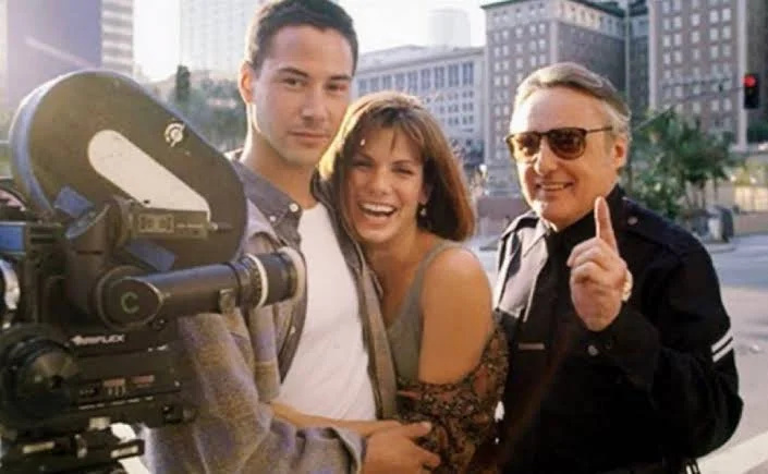   Keanu Reeves, Sandra Bullock in Dennis Hopper v bts of Speed