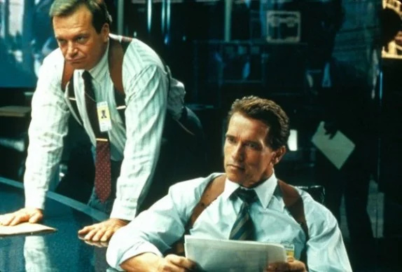   Tom Arnold y Arnold Schwarzenegger