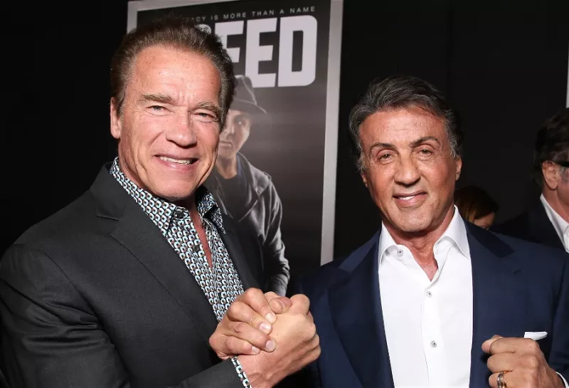   Arnold Schwarzenegger a Sylvester Stallone.
