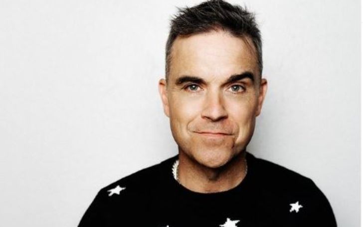 Englantilainen laulaja Robbie Williams listaa kotinsa 6,75 miljoonan punnan hintaan - Lisätietoja nettovarallisuudestaan ​​​​ja omaisuudestaan