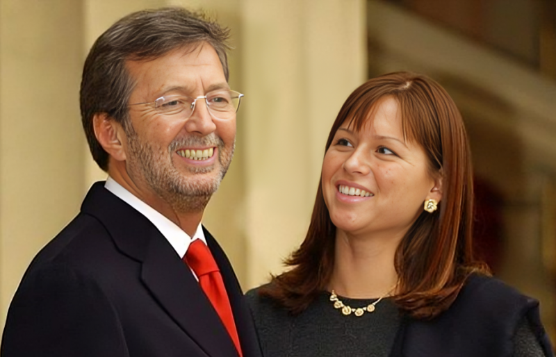   Julia's parents; Eric Clapton, and Ms. McEnery, 